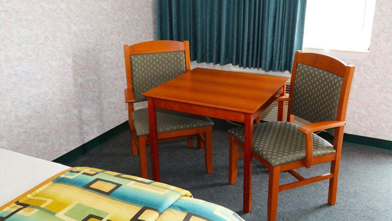 Magnuson Hotel Howell/Brighton Ngoại thất bức ảnh