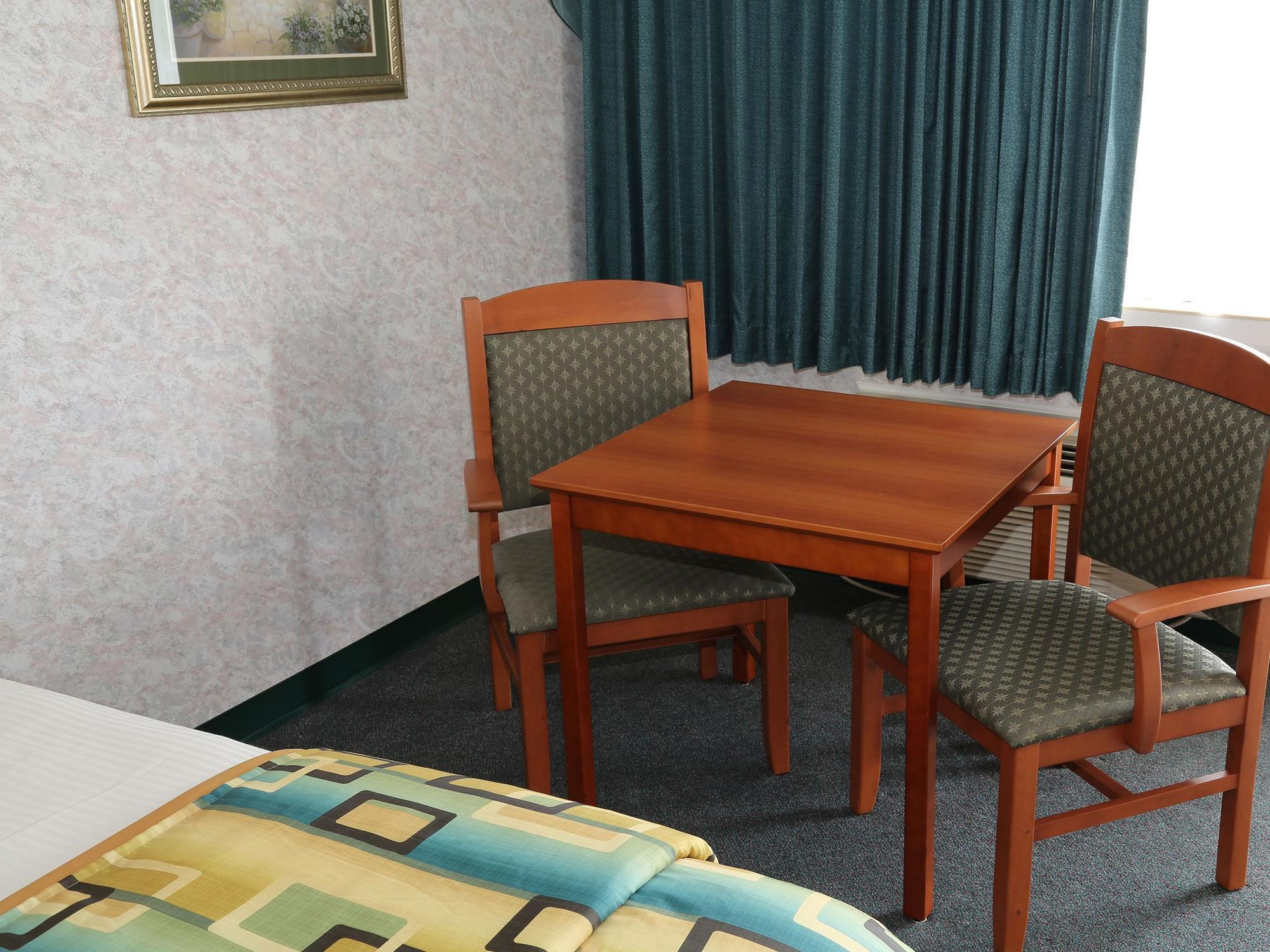 Magnuson Hotel Howell/Brighton Ngoại thất bức ảnh
